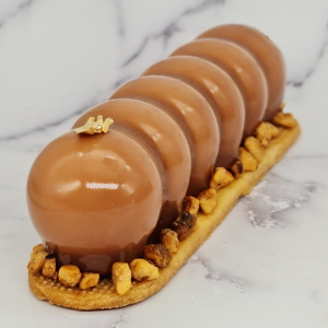 Entremet poire, noisette et chocolat